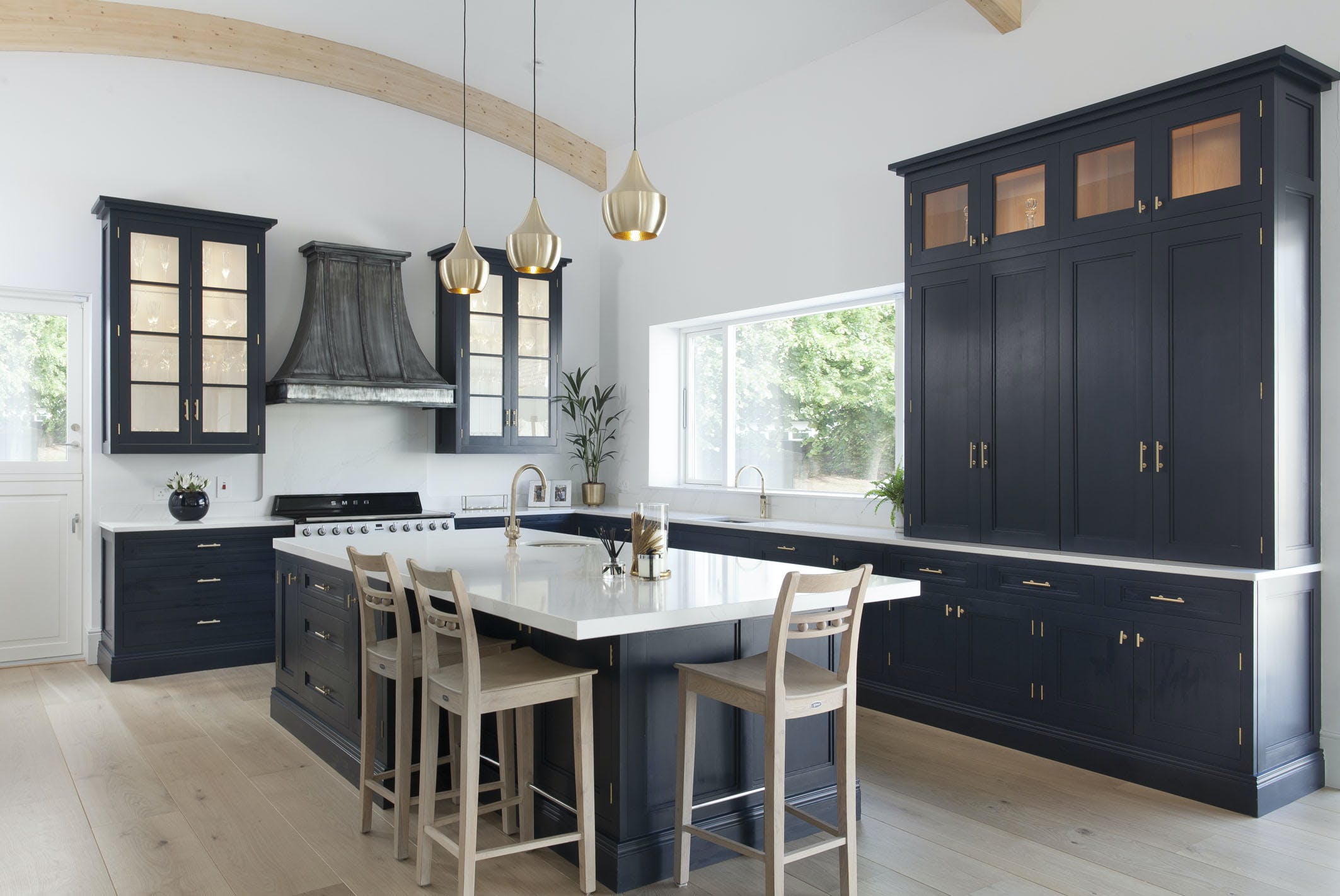 Kitchen by Shalford Interiors featuring White Silestone Calacatta Gold Worktops