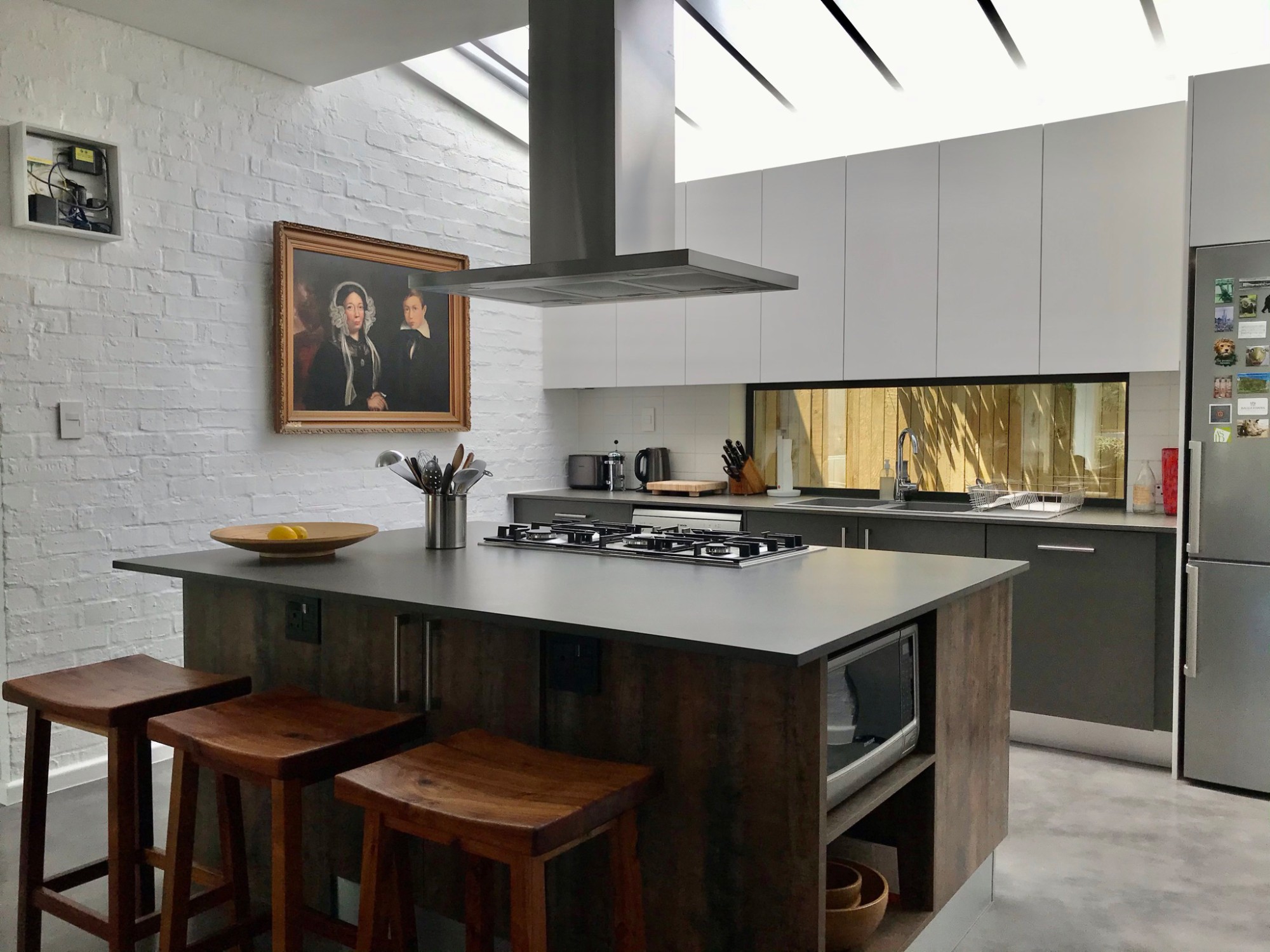 Image of Kitchen island in Dekton design and functionality for an open kitchen - Cosentino