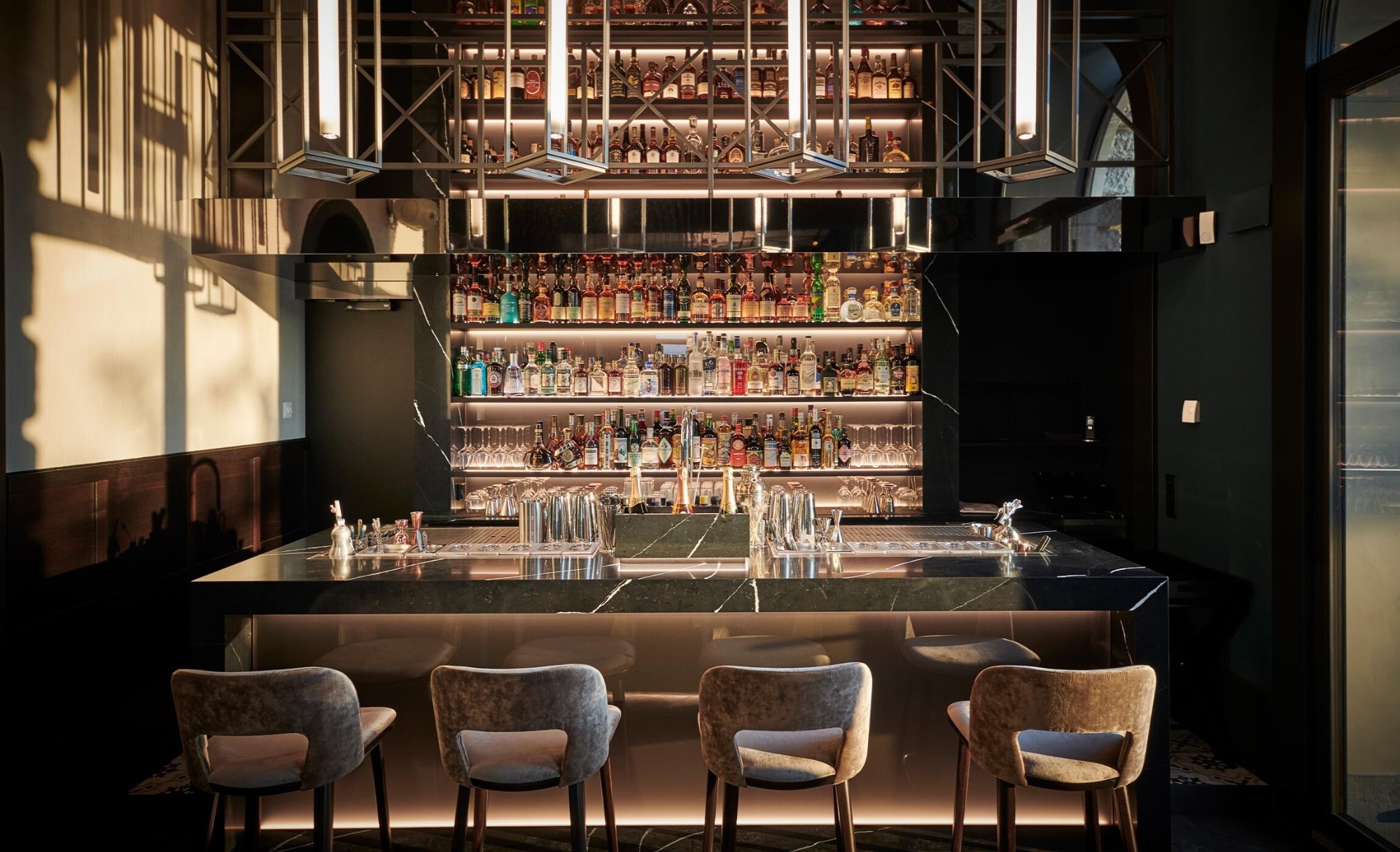 Image of bar am wasser referenz QUER kueng schreinerei emmen 28 in The second and glamorous life of the La Bastide Bourrelly Hotel thanks to an elegant renovation with Dekton and Silestone materials - Cosentino