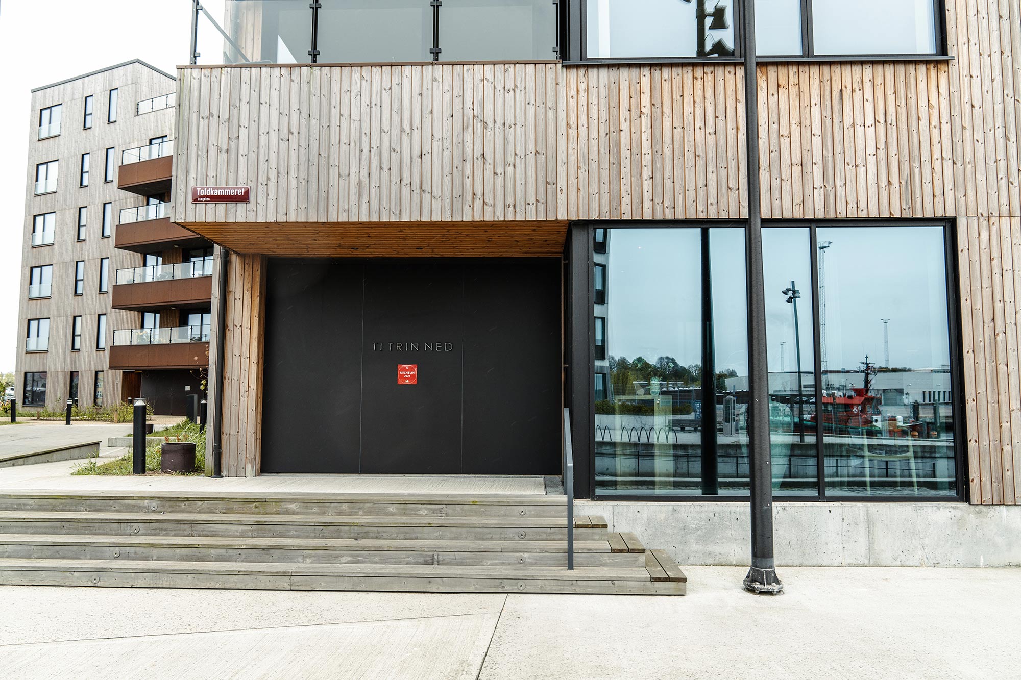 Image of Ti Trin Ned New Entrance 1 in This Michelin-starred Danish restaurant uses Dekton on its façade to withstand the harsh marine environment  - Cosentino