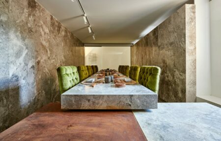 Image of mesas casas colgadas cuenca sala vip 2 in Two restaurants with a shared kitchen achieve visual continuity thanks to Dekton - Cosentino
