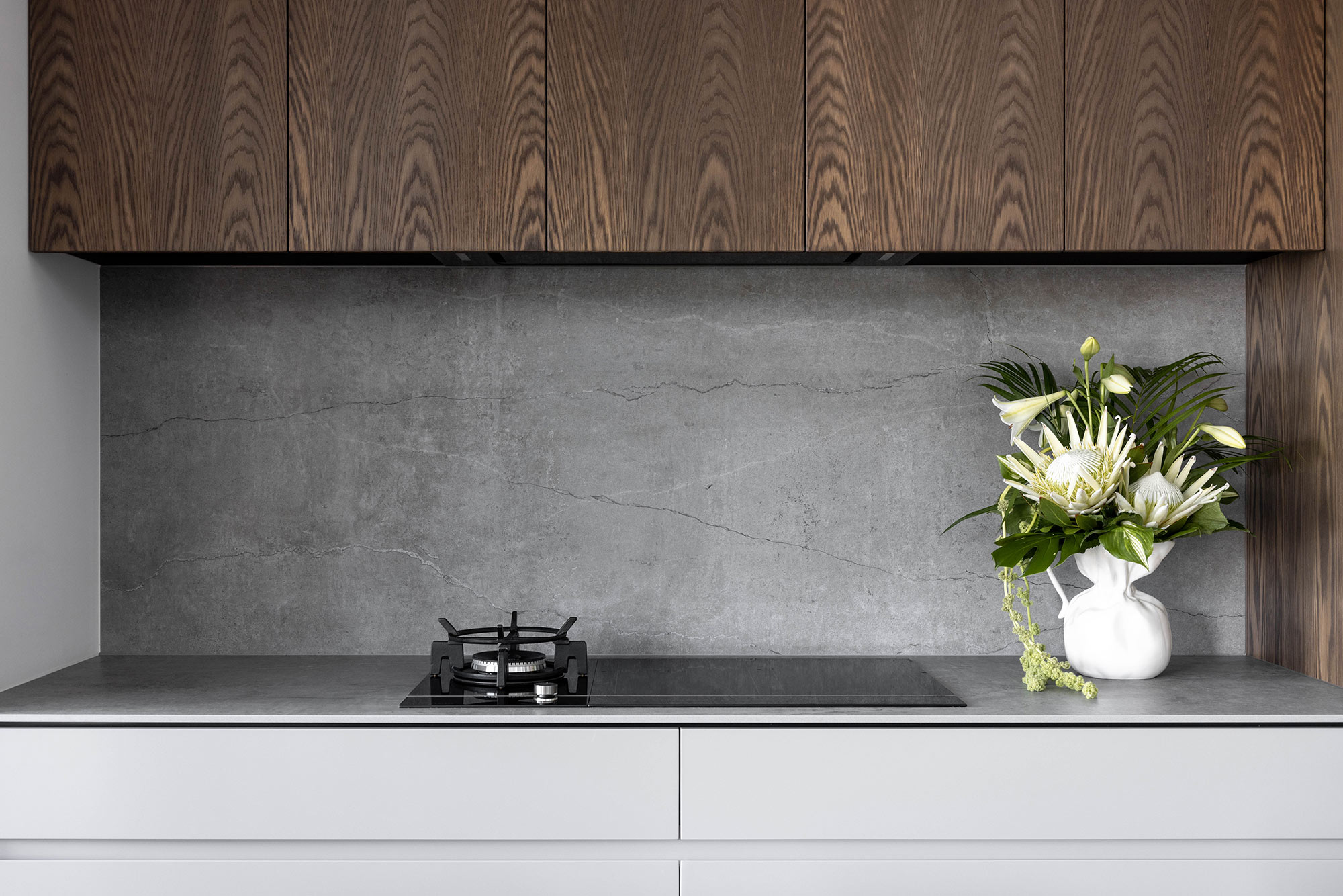 Image of Gulf Harbour 15 in Two Dekton colours to match wood in kitchens and bathrooms - Cosentino