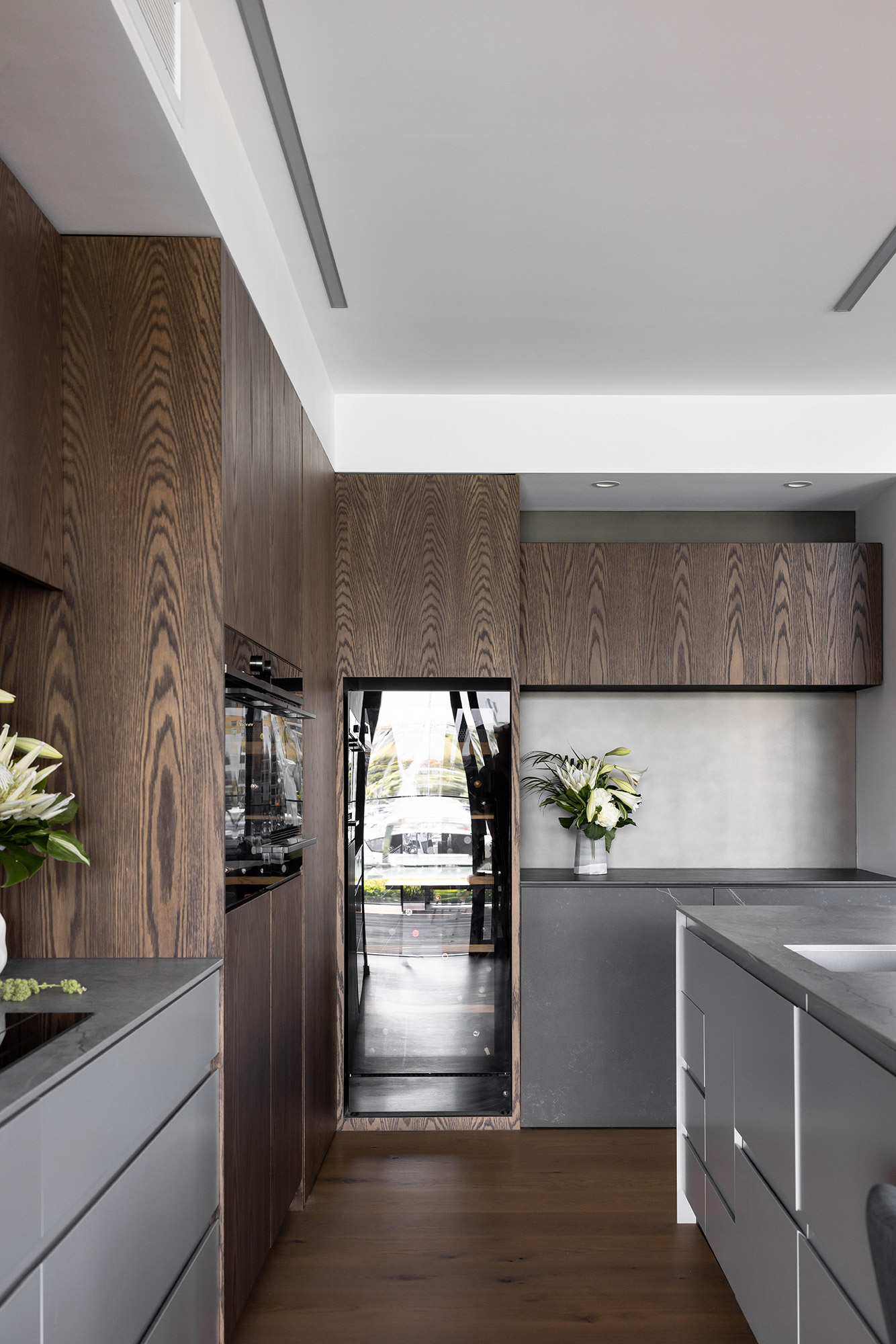 Image of Gulf Harbour 3 in Two Dekton colours to match wood in kitchens and bathrooms - Cosentino