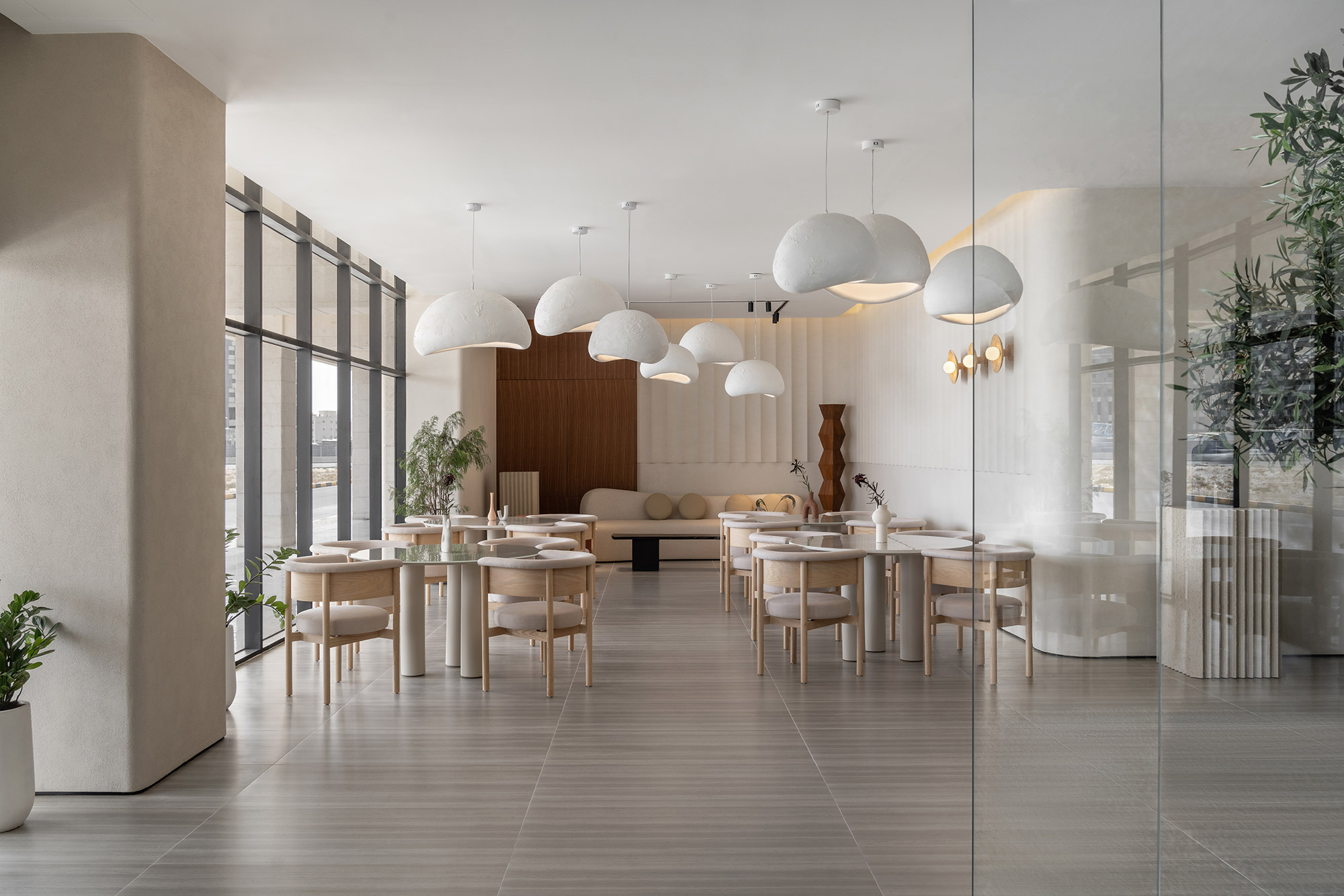 Image of The House by Cest ici Design 3 1 in Tables with Dekton Bergen for coffee lovers in a cozy Emirati space - Cosentino