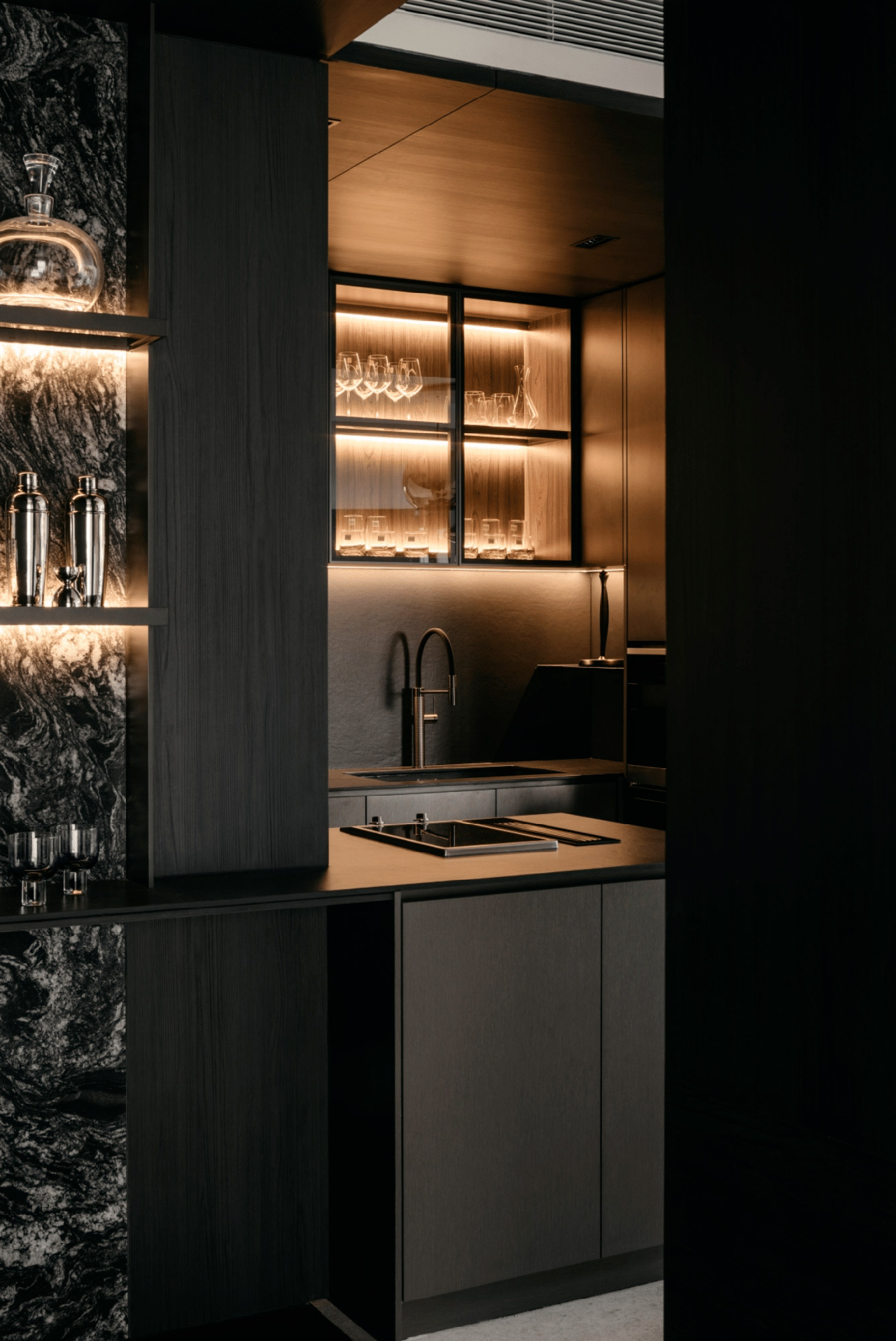 Image of Sensa Black Beauty 2ND EDITION 3 in Sensa natural granite becomes the centrepiece of a luxury kitchen that doubles as a living space - Cosentino